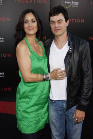 Photo for Carrie-Anne Moss, Steven Roy at the Los Angeles premiere of 'Inception' held at the Grauman's Chinese Theatre in Hollywood, USA on July 13, 2010. - Royalty Free Image