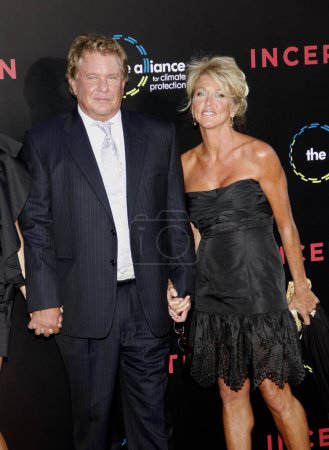 Photo for Tom Berenger, and Laura Moretti at the Los Angeles premiere of 'Inception' held at the Grauman's Chinese Theatre in Hollywood, USA on July 13, 2010. - Royalty Free Image