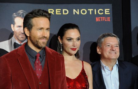 Photo for Ted Sarandos, Gal Gadot and Ryan Reynolds at the World Premiere of Netflix's 'Red Notice' held at the L.A. LIVE in Los Angeles, USA on November 3, 2021. - Royalty Free Image