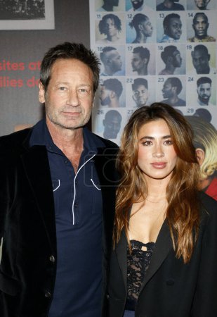 Photo for David Duchovny and Monique Pendleberry at the Los Angeles premiere of Netflix's 'You People' held at the Regency Village Theatre in Westwood, USA on January 17, 2023.. - Royalty Free Image