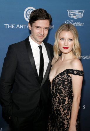 Photo for Topher Grace and Ashley Grace at the Art Of Elysium's 12th Annual Heaven Celebration held at the Private Venue in Los Angeles, USA on January 5, 2019. - Royalty Free Image