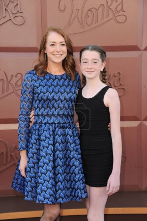 Photo for Alyson Hannigan and Satyana Marie Denisof at the Los Angeles premiere of 'Wonka' held at the Regency Village Theater in Westwood, USA on December 10, 2023. - Royalty Free Image