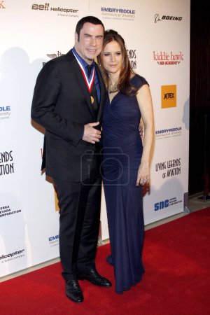 Foto de John Travolta y Kelly Preston en los Living Legends Of Aviation Awards celebrados en el Beverly Hilton Hotel en Los Ángeles, California, Estados Unidos el 18 de enero de 2013. - Imagen libre de derechos