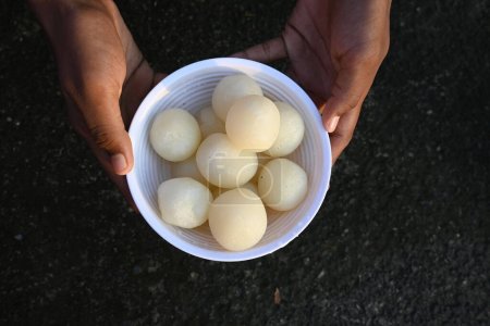 Photo for Indian Sweets Rasgulla.This sweet originated in West Bengal, India. Other names for the dish include, Rasagulla,Rossogolla, Roshogolla,Rasagola, Rasagolla. Most popular sweet of all over India. - Royalty Free Image