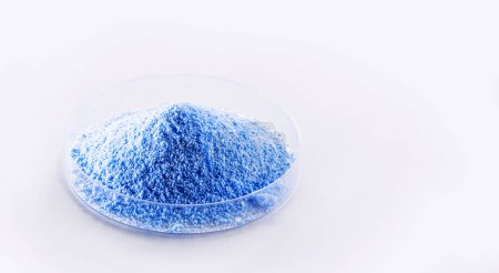 Photo for Blue Fluorescent pigments, made up of a polymeric matrix, resins of different types such as polyester, alkyd, formaldehyde which are fused with organic dyes. - Royalty Free Image