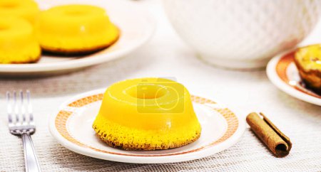 Photo for Brazilian quindim is a typical sweet from the northeast, It corresponds to the Portuguese recipe known as brisa-do-Lis, typical sweet made with eggs - Royalty Free Image