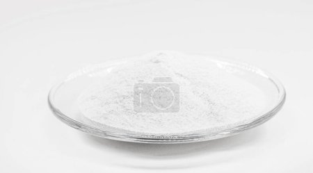 Photo for Mica sericite or sericite is a fine grayish white powder, a hydrated potassium alumina silicate. Component of the food industry. - Royalty Free Image