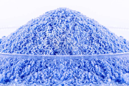 Photo for Powder fertilizer, blue color, NPK, water soluble, soil amendment, agribusiness industry, macro photography - Royalty Free Image