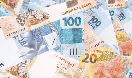 varios billetes de banco brasileños, billetes reales en textura y fondo