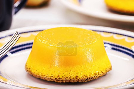 Photo for Brazilian quindim is a typical sweet from the northeast, It corresponds to the Portuguese recipe known as brisa-do-Lis - Royalty Free Image