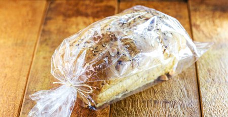 Photo for Brazil nut bread, packaged in biodegradable plastic, organic and vegan food made at home - Royalty Free Image