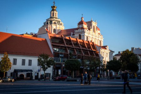 Photo for Vilnius, Lithuania - September 26, 2022: Townhall Square and a baroque church of Saint Casimir (Svento Kazimiero) in the Old Town of Vilnius. - Royalty Free Image