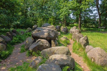 Photo for Standing an extremity of Dolmen 25a-c known as the Kleinenkneter Stones in Wildeshausen - Royalty Free Image