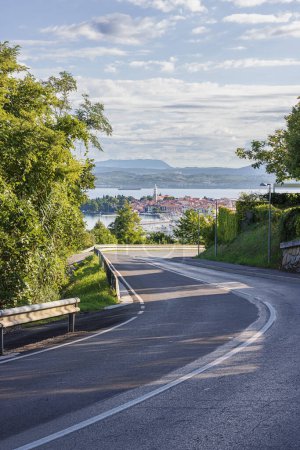 Photo for A winding road to Izola with the Adriatic Sea in the background - Royalty Free Image