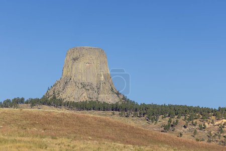Photo for Devils Tower and its surroundings, seen from the beginning of the access road - Royalty Free Image