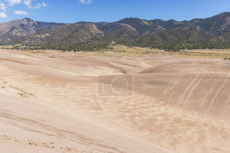 Photo for Medano Creek and traces of sand boarding in  the Great Sand Dunes National Park - Royalty Free Image