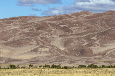 Photo for Close up of high sand dunes seen fron the access road of the Great Sand Dunes National Park - Royalty Free Image