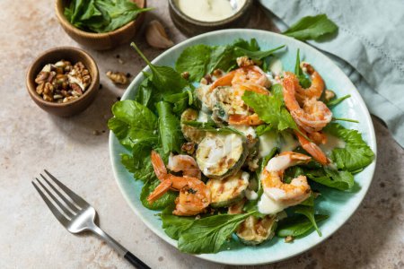 Photo for Healthy food concept. Vegetarian vegetable low carb lunch bowl. Diet salad shrimps with arugula, grilled zucchini and walnut. - Royalty Free Image