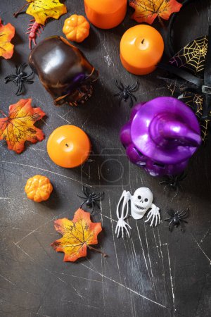 Photo for Creative background Halloween party concept. Holiday decorations - Halloween pumpkins, candle, lantern and decoration on dark stone background. View from above. Copy space - Royalty Free Image