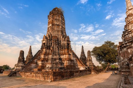 Photo for Historical ancient art and Architecture at Wat Chaiwattanaram old temple in Ayutthaya province Thailand in the beautiful sunset sky - Royalty Free Image