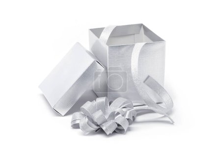 Foto de Opened celebration silver gift or present boxes for celebrate party event decoration isolated on white background - Imagen libre de derechos