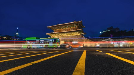 Photo for Seoul, South Korea, July 22, 2023: Heunginjimun Gate at night the historical architecture in the city nearby Dongdaemun design plaza. - Royalty Free Image