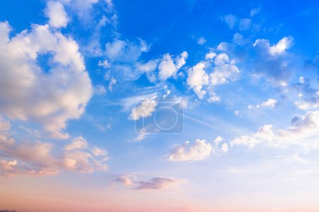 Photo for Beautiful bright blue sky with the fluffly clouds - Royalty Free Image