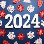 Happy New Year 2024 alphabet letter with Christmas decoration on blue background