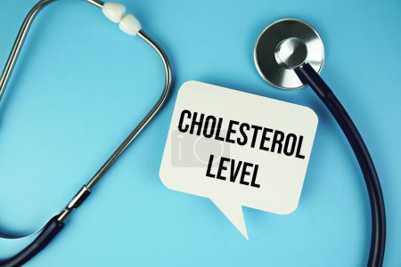 Photo for Cholesterol Level text message on speech bubble with Stethoscope  top view on blue background, Health concept background - Royalty Free Image