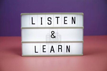 Listen & Learn letterboard text on LED Lightbox on pink and purple background