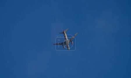 Photo for Airplane in the sky with clouds - Royalty Free Image