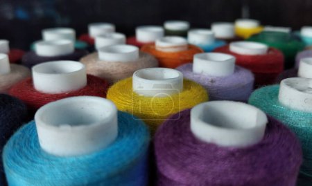 Photo for Colorful spools of thread for embroidery close up background - Royalty Free Image