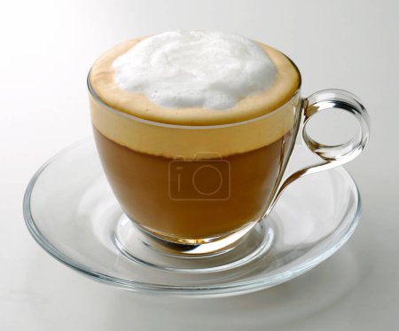 Foto de Cappuccino in glass cup on white background - Imagen libre de derechos