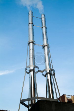 Photo for Perspective view Chimney in double polished steel tube - Royalty Free Image