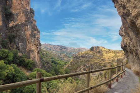 Photo for A Bridge on the Edge of a Cliff with Nature Sight in Los Cahorros, Andalusia, Spain - Royalty Free Image