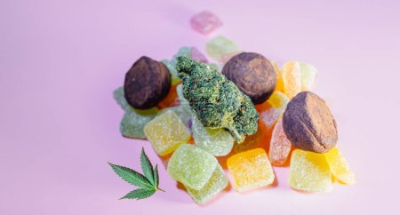 Photo for Medical Marijuana Edibles, Candies Infused with CBD HHC or THC Cannabis in food industry - Royalty Free Image