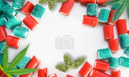 Photo for Cannabis products flat lay buds and gummy candies on white with copy space - Royalty Free Image