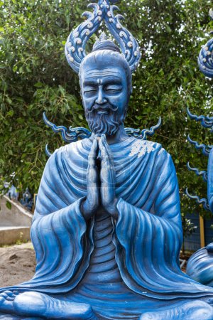 Photo for Wat Rong Suea Ten, better known as The Blue Temple, is located in Chiang Rai, a four-hour drive north of Chiang Mai. The temple statues and walls are decorated in a brilliant blue hue of sapphire. - Royalty Free Image