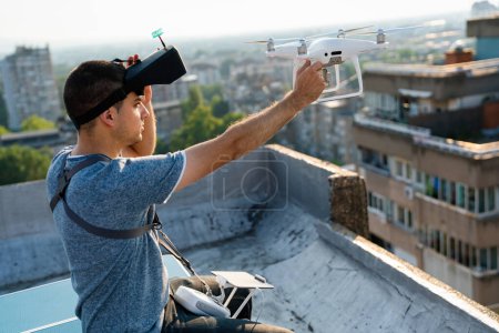 Photo for Man with drone flying at the city outdoor. - Royalty Free Image