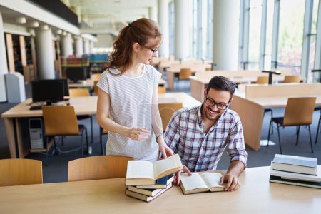 Photo for Students are studying in library. Young success people are spending time together and learning together. - Royalty Free Image