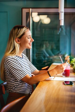 Photo for Portrait of happy young excited woman making a video chat on digital device. People education work concept - Royalty Free Image