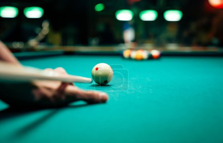 Photo for Preparing to break spheres into the pool pocket. People billiard, snooker entertainment fun concept. - Royalty Free Image
