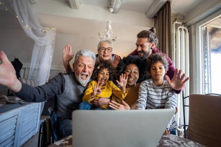 Photo for Extended multiethnic multigenerational family together at home during video call. People happiness technology concept - Royalty Free Image