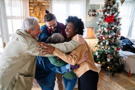Photo for Happy multiethnic multigenerational family enjoying Christmas time together. People love concept. - Royalty Free Image