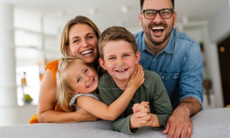 Photo for Happy family having fun and spending time together at home. Child parenting love concept - Royalty Free Image