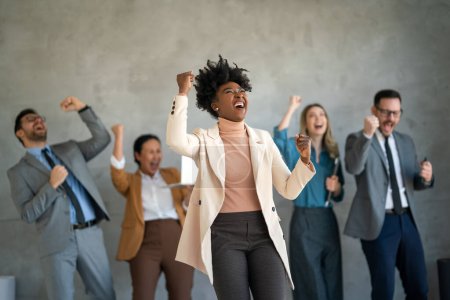 Photo for Euphoric excited business team celebrate corporate victory together in office, happy overjoyed professionals group rejoice company victory, teamwork success win triumph concept - Royalty Free Image