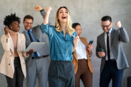 Photo for Euphoric excited business team celebrate corporate victory together in office, happy overjoyed professionals group rejoice company victory, teamwork success win triumph concept - Royalty Free Image