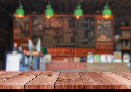 Photo for Perspective brown wooden board over blurred coffee shop counter - Royalty Free Image