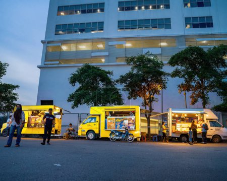 Photo for Bukit Jalil, Malaysia - Aug 16, 2022 Food trucks selling various selections at the Euro Fun Park fun fair at night. - Royalty Free Image