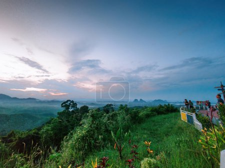 View from the lookup point of mountains during sunrise in Wang Kelian, Perlis, Malaysia.